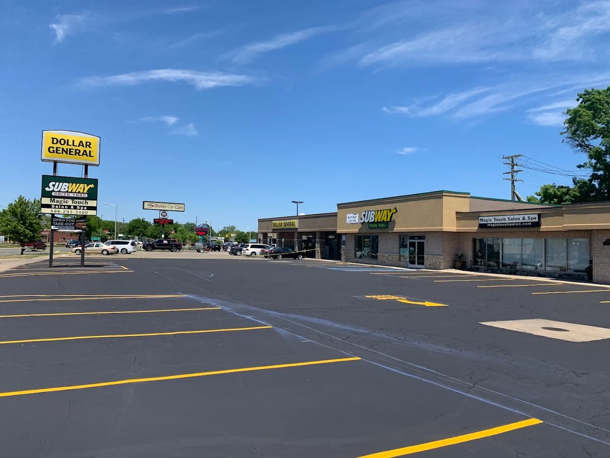 Freshly paved and striped commercial parking lot